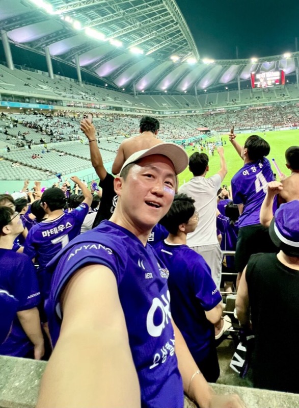 In the stands at a football match